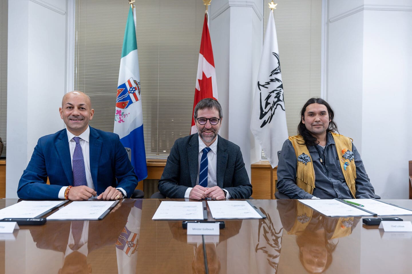 Photo of Ross River Dena Council Chief Dylan Loblaw, Yukon Premier Ranj Pillai, and the Honourable Steven Guilbeault, Minister of Environment and Climate Change and Minister responsible for Parks Canada, signed a Memorandum of Understanding to assess the feasibility of establishing a national park reserve and Indigenous Protected and Conserved Area within the Ross River region in the Yukon.