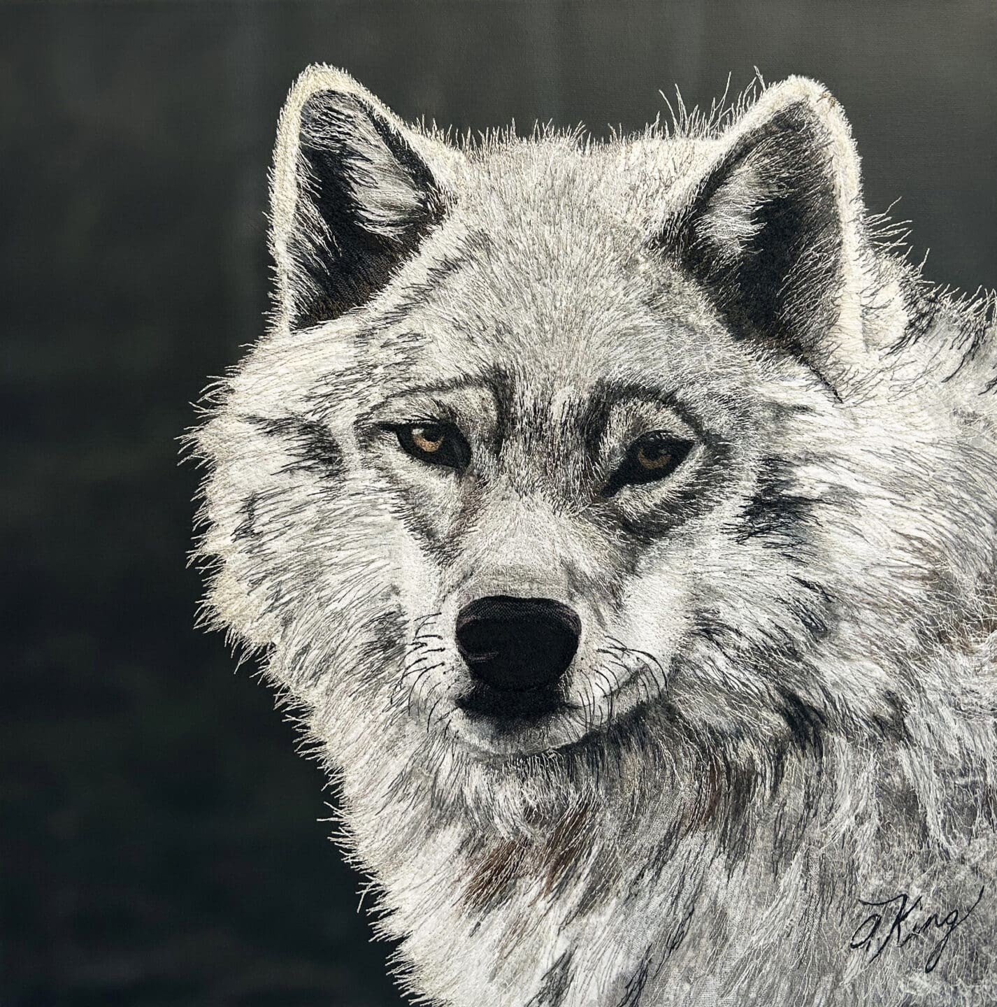 A wolf textile art piece by Alison King